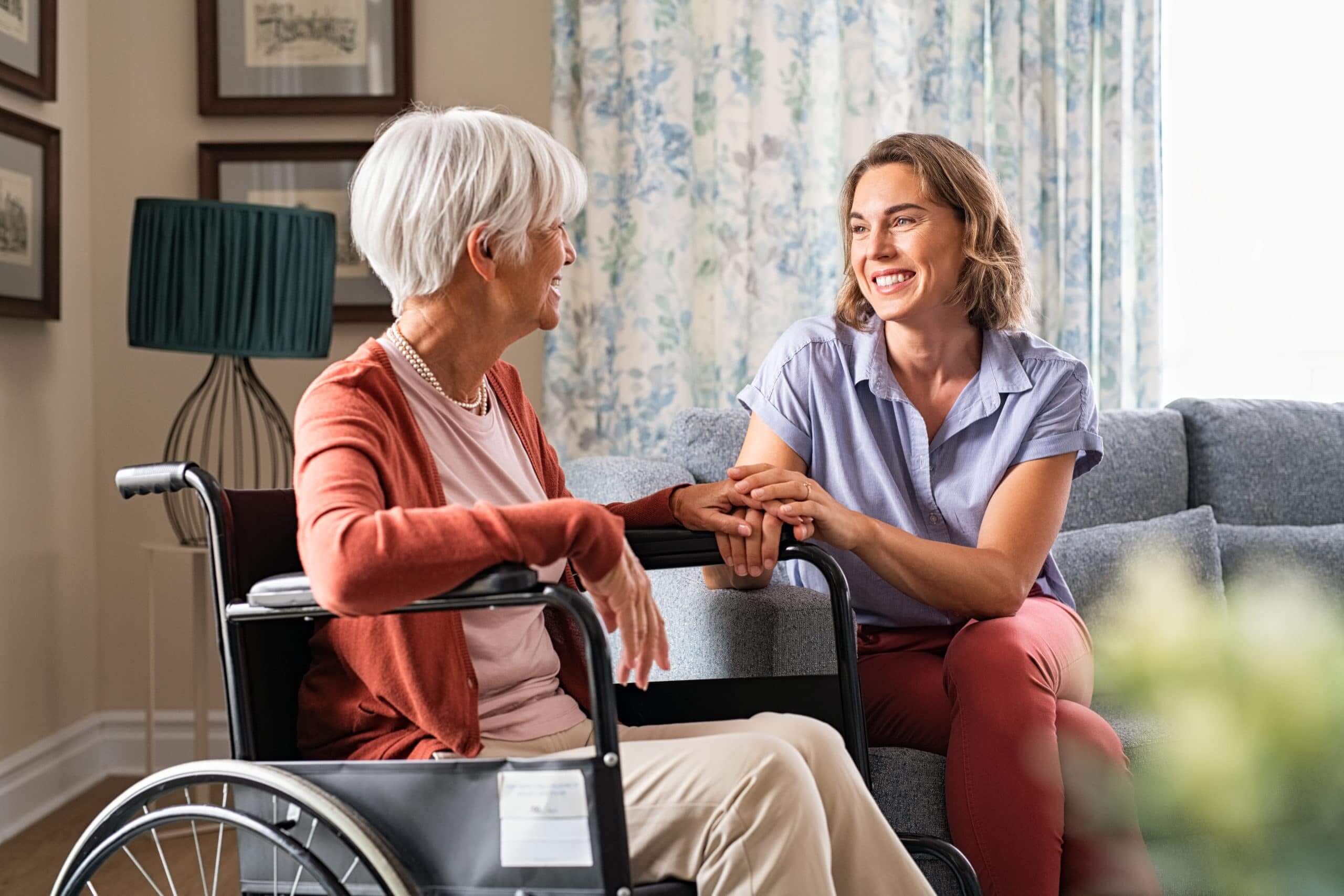 daughter visits mother at nursing home