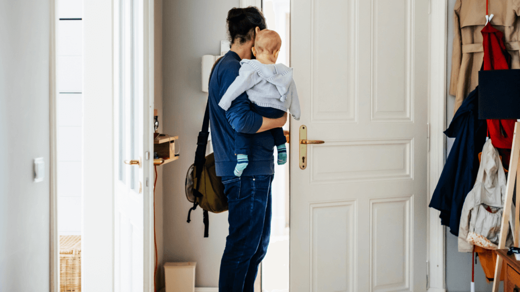 A mother and her child leaving the house.