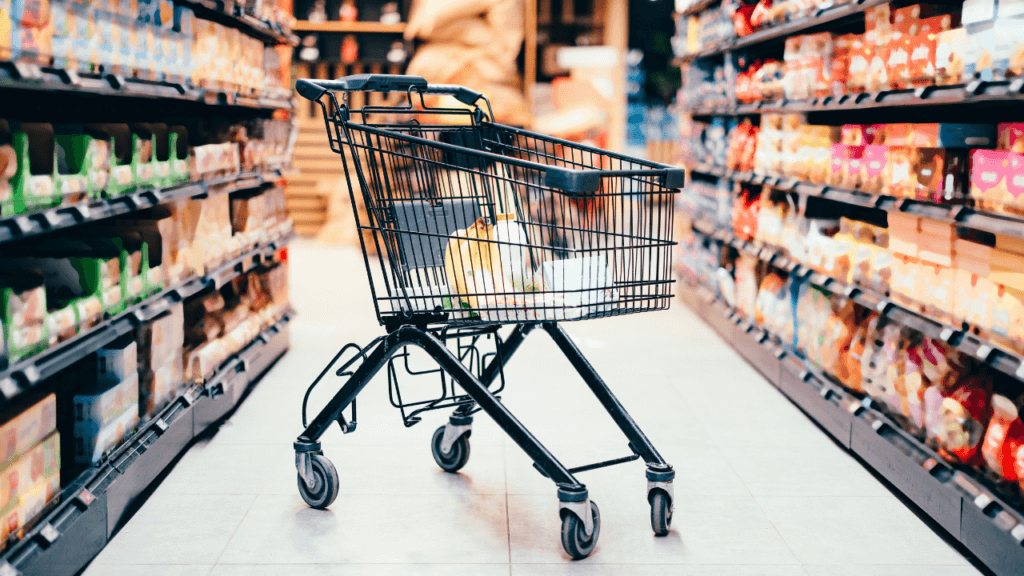 Shopping cart in a grocery aisle