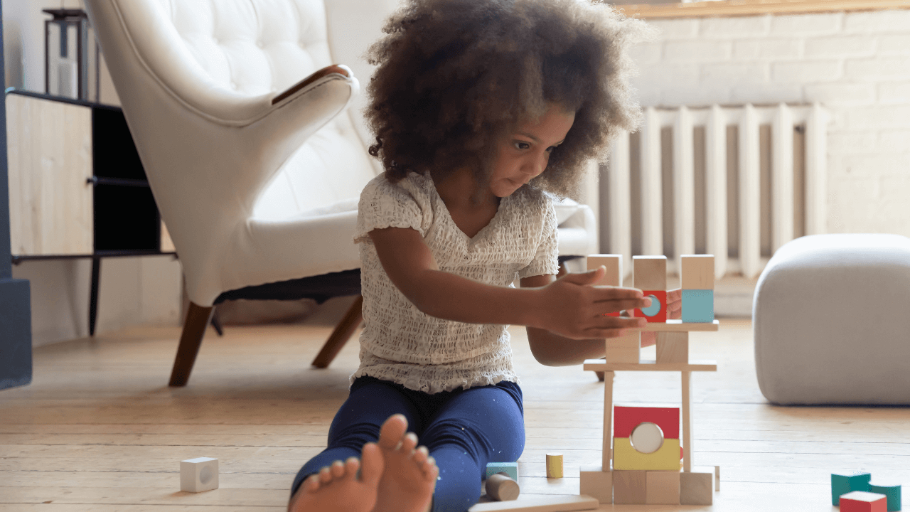 A child playing with blocks.