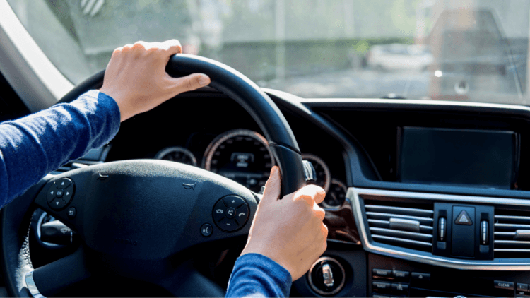 A man driving a car.