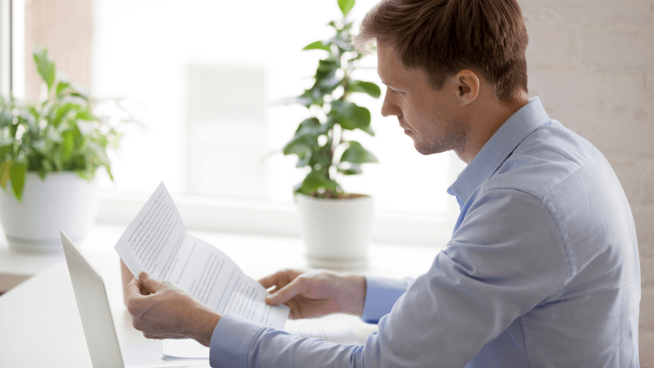 A person reading documents.