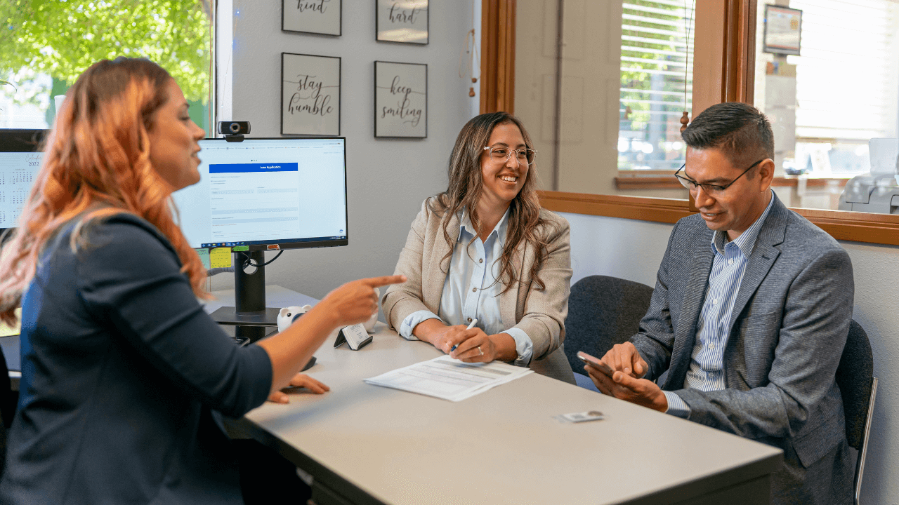 An estate planning attorney discussing with her clients.