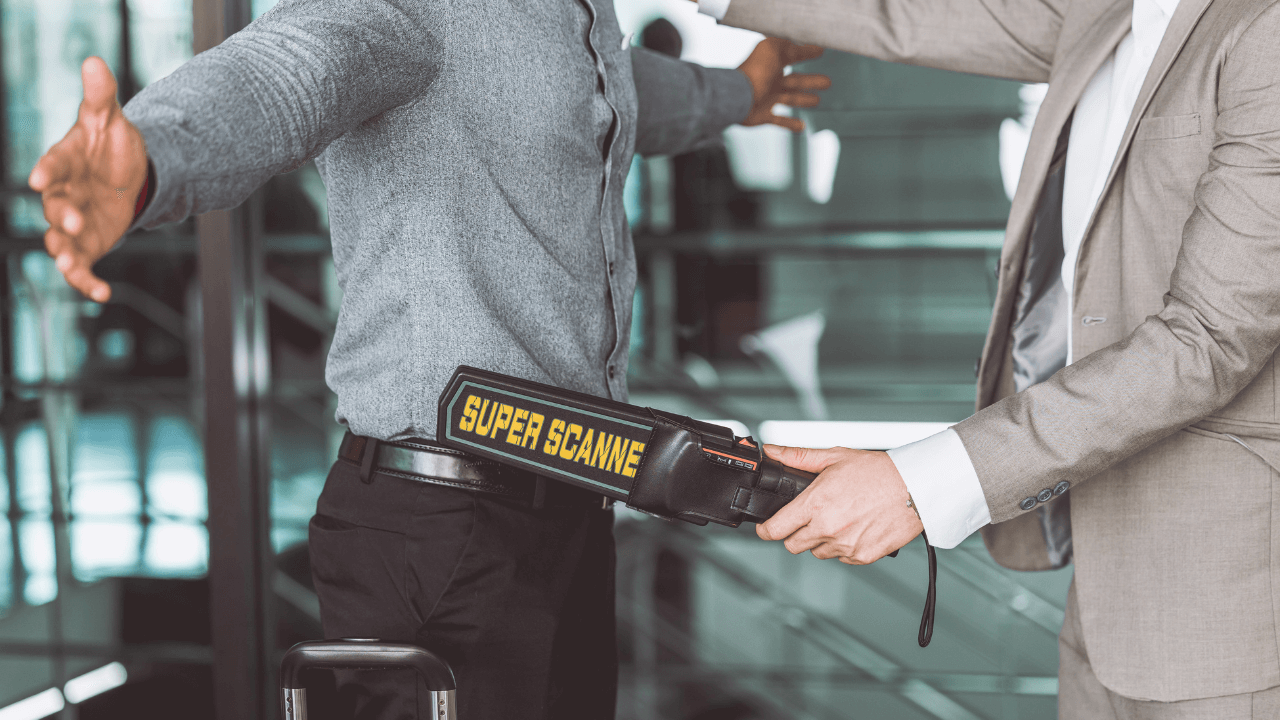 A man going through airport security.